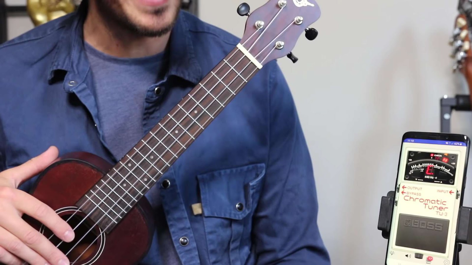 Close up of man with ukulele