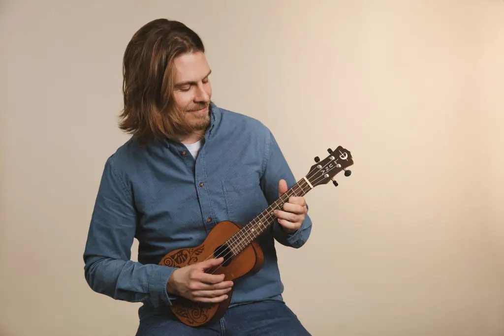 Man playing ukulele